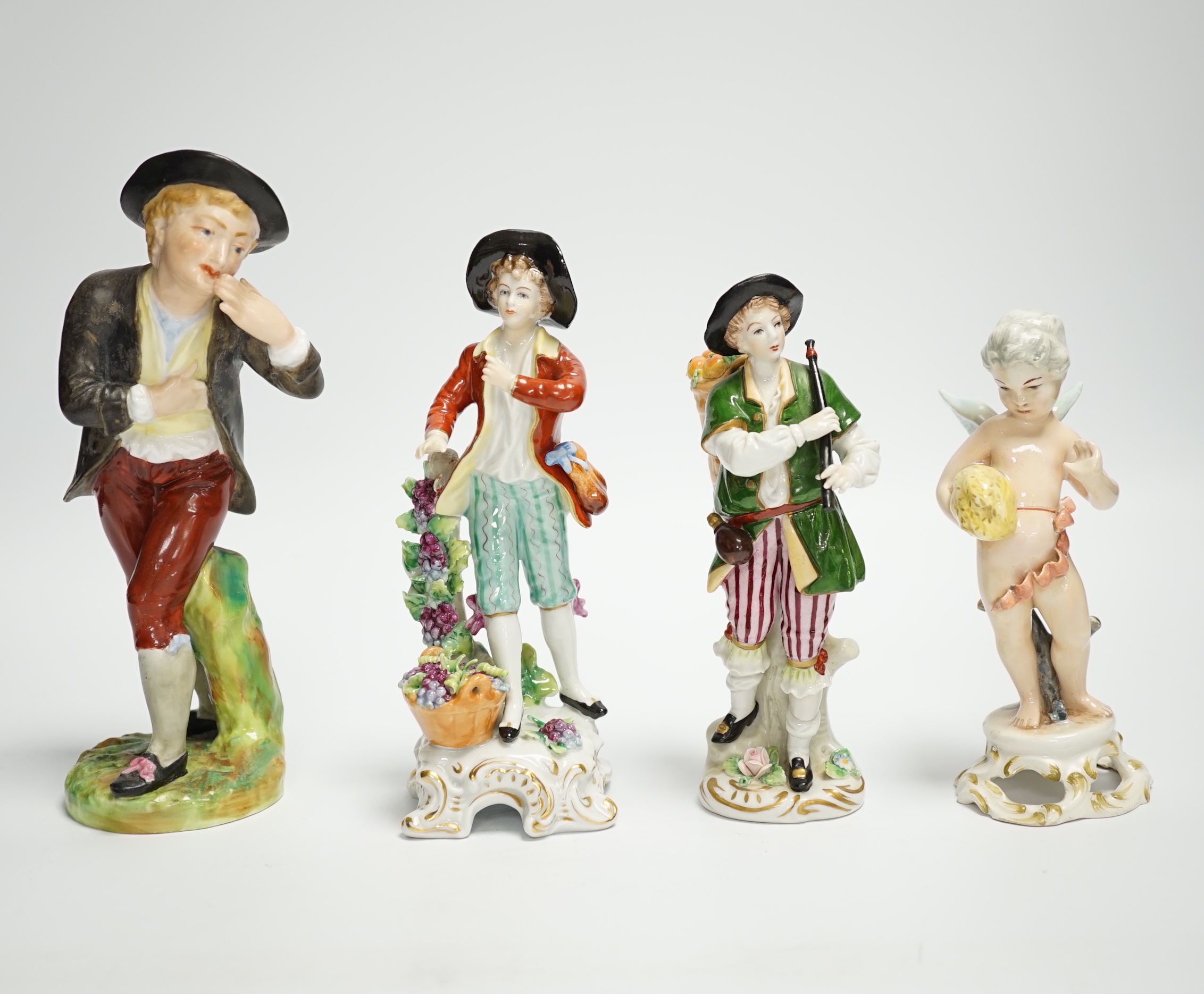 A group of 19th century and later porcelain figurines including Sitzendorf, 18cm high